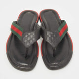 Gucci black leather web flip flop sandals