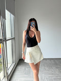 Revolve white pleated skirt