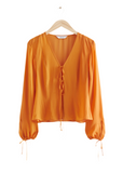 Stockholm Atelier & Other Stories orange sheer tie blouse