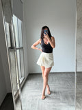 Revolve white pleated skirt