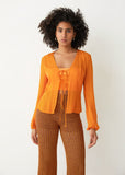 Stockholm Atelier & Other Stories orange sheer tie blouse