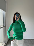 Munai green turtle neck sweater