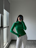 Munai green turtle neck sweater