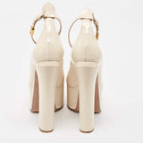 Valentino super platform Tan-go patent pumps